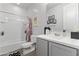 Clean bathroom, featuring a bathtub, toilet and modern vanity at 10037 E Rubidium Ave, Mesa, AZ 85212