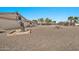 Large backyard with gravel and mature tree at 10312 W Sierra Dawn Dr, Sun City, AZ 85351