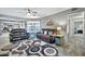 Living room with leather couches, view into kitchen and bedroom at 10312 W Sierra Dawn Dr, Sun City, AZ 85351