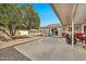 Spacious covered patio with seating and outdoor grill at 10312 W Sierra Dawn Dr, Sun City, AZ 85351