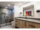 Modern bathroom with a large walk-in shower and floating vanity at 10598 E Fernwood Ln, Scottsdale, AZ 85262