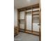 Large walk-in closet with ample shelving and hanging space at 10598 E Fernwood Ln, Scottsdale, AZ 85262