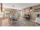 Cozy dining area with a wooden table and access to entryway at 11608 W Oglesby Ave, Youngtown, AZ 85363