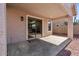 Covered patio with sliding glass doors leading to the backyard at 12838 N 148Th Ln, Surprise, AZ 85379