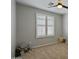 Spacious bedroom with plantation shutters and ceiling fan at 12838 N 148Th Ln, Surprise, AZ 85379