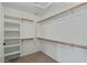 Large walk-in closet with ample shelving and hanging space at 12838 N 148Th Ln, Surprise, AZ 85379