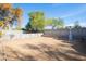 Large backyard area with block fencing and minimal landscaping offers ample space for customization at 14019 N 51St Dr, Glendale, AZ 85306