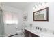 Bathroom with vanity and soft lighting, creating a peaceful setting at 14019 N 51St Dr, Glendale, AZ 85306