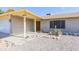 Charming single-story home with desert landscaping, brick accents, and a welcoming double-door entrance at 14019 N 51St Dr, Glendale, AZ 85306