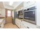 Bright kitchen featuring granite counters, stainless steel appliances, and ample cabinet space at 14019 N 51St Dr, Glendale, AZ 85306