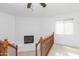 View of living area featuring a charming fireplace at 14019 N 51St Dr, Glendale, AZ 85306