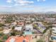 Expansive aerial view showcasing a modern home, pool, and neighborhood at 15008 N Tamarack Ln, Fountain Hills, AZ 85268