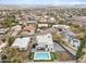 Aerial view of a modern home with pool, surrounded by other homes at 15008 N Tamarack Ln, Fountain Hills, AZ 85268