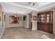 Formal dining room featuring tile floors and elegant chandelier at 15138 W Fillmore St, Goodyear, AZ 85338