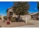 Two-story house with attached garage and landscaping at 15138 W Fillmore St, Goodyear, AZ 85338