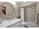 Clean bathroom with a white vanity, hexagonal marble tile, and a large mirror at 15429 E Palomino Blvd, Fountain Hills, AZ 85268