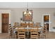 Rustic wooden dining set in a well-lit dining room at 15429 E Palomino Blvd, Fountain Hills, AZ 85268