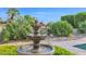 Ornate fountain in a lush, landscaped backyard setting at 15429 E Palomino Blvd, Fountain Hills, AZ 85268