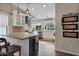 Modern kitchen with granite countertops, white cabinets, and an island at 15429 E Palomino Blvd, Fountain Hills, AZ 85268