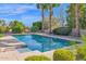 Inviting pool with a spacious deck, surrounded by lush landscaping at 15429 E Palomino Blvd, Fountain Hills, AZ 85268