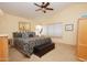 Spacious main bedroom with ample natural light and a large bed at 15435 N 51St St, Scottsdale, AZ 85254