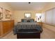 Bright main bedroom featuring a comfortable bed and plenty of light at 15435 N 51St St, Scottsdale, AZ 85254