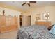 Well-appointed main bedroom with a king-size bed and built-in storage at 15435 N 51St St, Scottsdale, AZ 85254