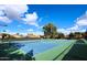 Community tennis courts with ample space and surrounding homes at 15435 N 51St St, Scottsdale, AZ 85254