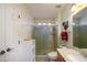 Clean bathroom with walk-in shower and updated vanity at 15725 W Linksview Dr, Surprise, AZ 85374