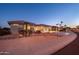 Attractive curb appeal with desert landscaping and two-car garage at 15725 W Linksview Dr, Surprise, AZ 85374