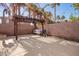 Relaxing backyard patio with pergola and seating area at 15839 W Calavar Rd, Surprise, AZ 85379