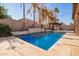 Stunning pool with water feature and pergola at 15839 W Calavar Rd, Surprise, AZ 85379