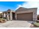 Single story house with a two car garage and stone accents at 1631 N Beverly --, Mesa, AZ 85201