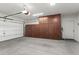 Garage with storage cabinets and an automatic door opener at 1631 N Beverly --, Mesa, AZ 85201