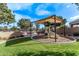 Community playground with shade structure and slide at 1631 N Beverly --, Mesa, AZ 85201