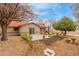 Large backyard with patio, garden area, and mature trees at 16420 N Scorpion Dr, Fountain Hills, AZ 85268