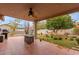 Backyard patio with fire pit and citrus tree at 16420 N Scorpion Dr, Fountain Hills, AZ 85268