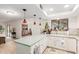 Galley kitchen features light cabinets and a view into the dining area at 16420 N Scorpion Dr, Fountain Hills, AZ 85268