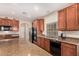 Kitchen with granite countertops and stainless steel appliances at 17584 W Andora St, Surprise, AZ 85388