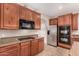 Kitchen features stainless steel appliances and ample cabinetry at 17584 W Andora St, Surprise, AZ 85388