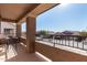 Covered patio with seating area and neighborhood view at 17584 W Andora St, Surprise, AZ 85388