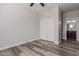 Bedroom with double doors and view of bathroom at 17962 W Vogel Ave, Waddell, AZ 85355