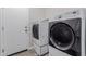 Laundry room with washer and dryer included at 17962 W Vogel Ave, Waddell, AZ 85355