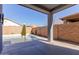 Covered patio overlooking the sparkling pool at 17962 W Vogel Ave, Waddell, AZ 85355