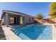 Inviting backyard with a sparkling blue pool at 17962 W Vogel Ave, Waddell, AZ 85355