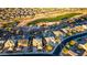 Aerial view of houses, golf course, and community at 18212 W East Wind Ave, Goodyear, AZ 85338