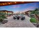 Entertaining backyard oasis with a firepit and pool at 18212 W East Wind Ave, Goodyear, AZ 85338