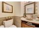 Elegant powder room with vessel sink and granite vanity at 18212 W East Wind Ave, Goodyear, AZ 85338