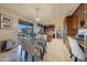 Kitchen with breakfast nook and access to backyard patio at 18212 W East Wind Ave, Goodyear, AZ 85338