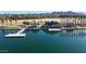 Lakefront view with a community dock and boathouse at 18212 W East Wind Ave, Goodyear, AZ 85338